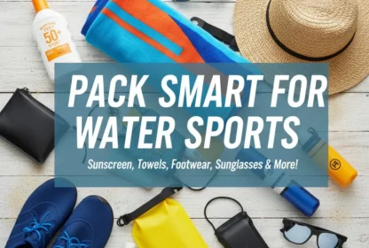 Flat lay of water sports essentials including sunscreen, a blue towel, water shoes, sunglasses, and a sun hat on a white wooden surface.